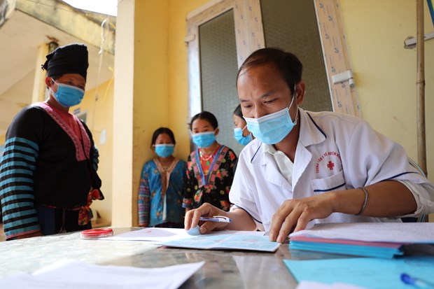 Chăm sóc tốt sức khỏe cho người dân và bảo đảm quyền lợi chính đáng cho cho đồng bào dân tộc thiểu số là trách nhiệm của cả hệ thống chính trị. (Ảnh: Nhật Anh/Vietnam+)